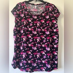 Beautiful Elle short sleeve floral blouse.